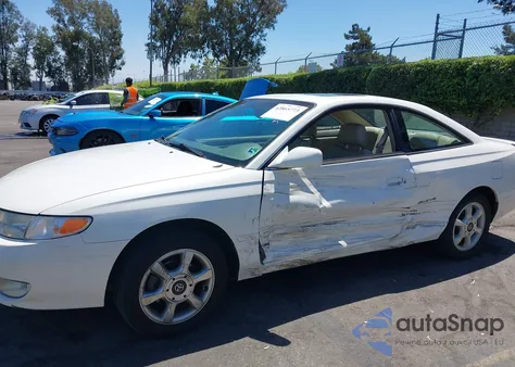 1999 Toyota Camry Solara Sle z USA, uszkodzony, nr VIN 2T1CF22P1XC210933